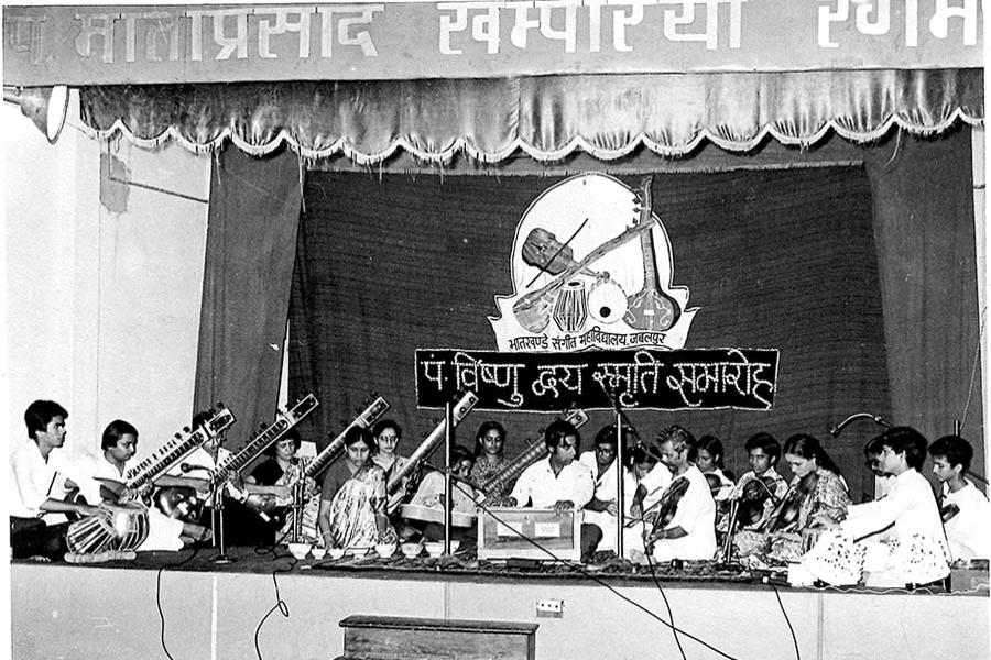 Brahmachari Girish Ji (second from left) is participating in Classical Music Orchestra at Bhatkhande Sangeet Mahavidyalaya, Jabalpur September 1982